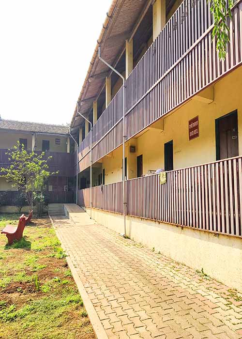 gayatri-hostel-corridor-community-bathroom